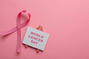 Pink Ribbon For World Cancer Day and Breast Cancer Awarness photo