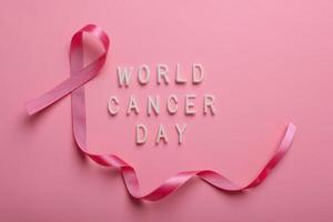 Pink Ribbon For World Cancer Day and Breast Cancer Awarness photo