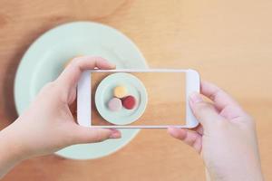 Taking photo of Sweet and colourful french macarons