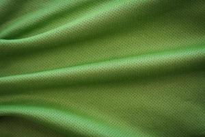 crumpled green fabric texture background photo