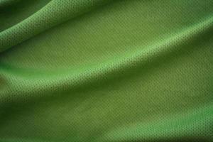 crumpled green fabric texture background photo