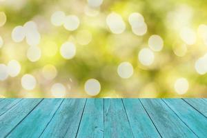 wood floor with abstract green nature background photo