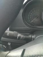 Modern car interior detail. Wipers control. photo