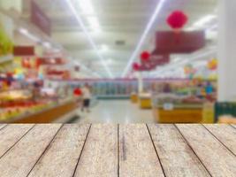 Wood floor and Supermarket blur background photo