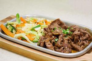 Beef with vegetables teppanyaki Japanese Cooking photo