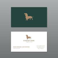 Business card in green and white with dog design in gold color vector