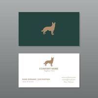 Business card in green and white with dog design in gold color vector