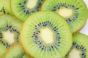 beautiful kiwi fruit slices background photo