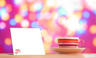 A bright pink metallic coffee cup on vacation.  And there is a blank sheet of note paper for inserting the contents. mock up and copy space photo