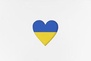 bandera de ucrania en forma de corazón aislada sobre fondo de cartón blanco. Cartulina impresa con forma de corazón troquelada. vista superior foto