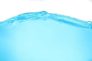 Blue surface water and air bubble isolated on white background photo