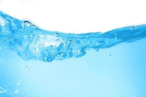 Blue surface water and air bubble isolated on white background photo