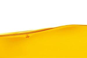 Wave of oil viscosity and air bubbles inside oil isolated on white background. photo