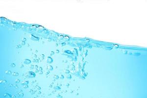 Blue surface water and air bubble isolated on white background photo