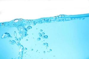 Blue surface water and air bubble isolated on white background photo