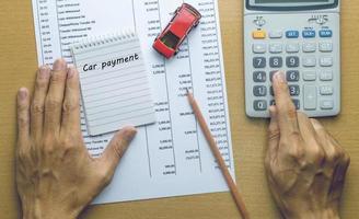 Man Planning Car payment photo