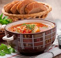 Ukrainian and russian national red soup borsch closeup photo