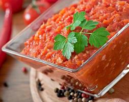 Red hot chili pepper and ingredients for sauce and sauce photo