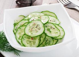 Fresh cucumber salad photo