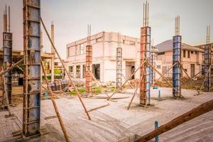 building process of a house column in construction site on housing project photo