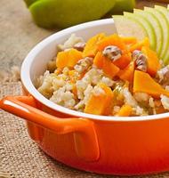 Oatmeal with pumpkin, apples, nuts and honey