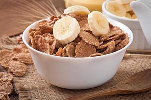 Healthy breakfast - whole grain muesli in a white bowl photo