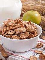 Healthy breakfast - whole grain muesli in a white bowl photo