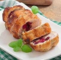 Chicken rolls with cranberries, cheese and honey photo