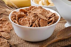 Healthy breakfast - whole grain muesli in a white bowl photo