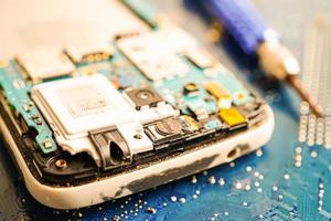 Repairing and upgrade mobile phone, electronic, computer hardware and technology concept. photo