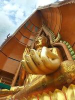 Kanchanaburi ,Thailand ,2020 - Big Buddha statue at Wat Tham Suea.
