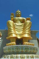 Nakhon Pathom, Thailand, 2020 - Picture of Golden Buddha in Wat Nong Phong Nok. photo