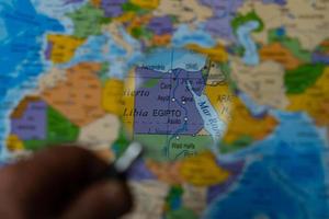 colorful view of egypt magnified with a magnifying glass, blurred background photo