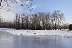 Outdoor Skating Rink on Pond photo