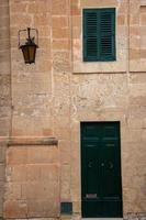 Bright colourful door way in a stone building photo