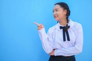 School girl on blue background. photo