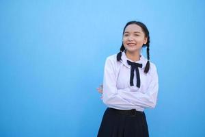 School girl on blue background. photo