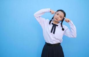 School girl on blue background. photo