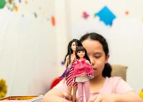 Bangkok,Thailand ,Feb22,2022-kid play barbie dolls photo