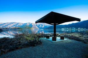 Public picnic set at Lake Kawaguchi, Japan. Impressive April morning scenery photo