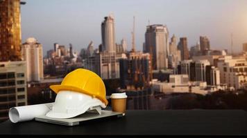 Construction house and building. Repair work. Dof laptop computer and office construction on table in office blurred background. photo