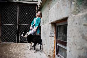 Trendy girl with laika husky dog photo