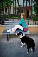 Trendy girl with laika husky dog photo