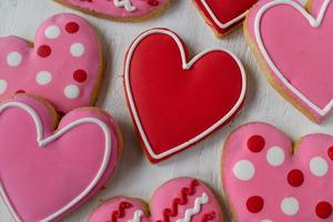 Group of Heart-shaped cookies with icing detail photo