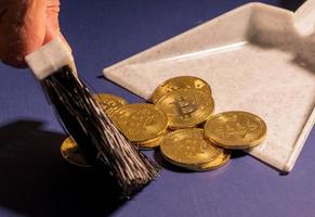 Concept for price collapse of bitcoin and cyber coins as they are trashed photo