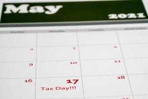 Tax Day concept for May 17 2021 using calendar and note