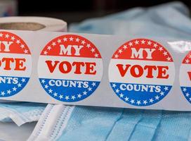 My vote counts paper sticker on medical face mask to illustrate election dispute photo