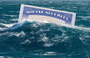 Concept of Social Security trust fund being in danger of exhaustion and sinking underwater photo