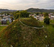 Ancient indian or native american burial mound in Moundsville, West Virginia photo