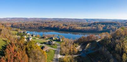 Aerial view of single family homes by Cheat Lake in the fall outside Morgantown in West Virginia photo